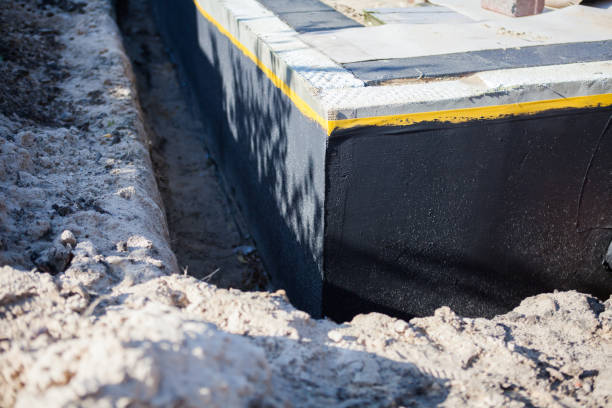 Professional Waterproofing technician working in Greendale, WI